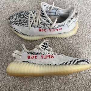 Yeezy Sneakers in Black, White, and Cream